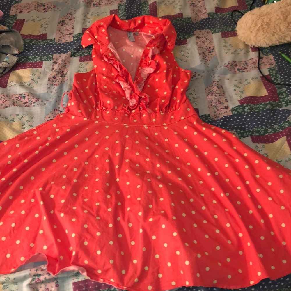 Im selling a above your knew low cut dress.